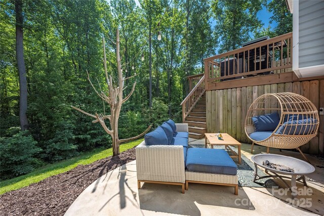 3902 Mcgee Point Rd, Terrell, NC 28682 - view of patio featuring stairway, a wooden deck, and an outdoor fire pit
