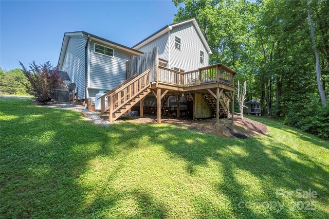 3902 Mcgee Point Rd, Terrell, NC 28682 - rear view of house featuring stairs, a wooden deck, and a lawn
