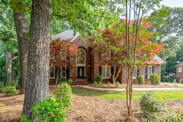 4672 Snow Dr, Harrisburg, NC 28075 - view of front of home with brick siding and a shingled roof