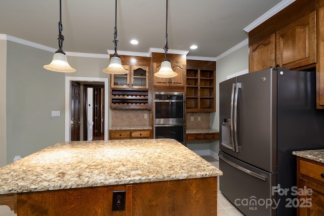 4672 Snow Dr, Harrisburg, NC 28075 - kitchen with stainless steel appliances, a kitchen island, light stone counters, backsplash, and open shelves