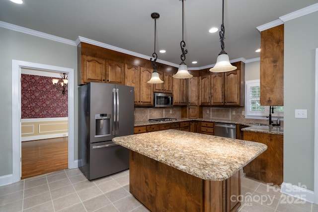 4672 Snow Dr, Harrisburg, NC 28075 - kitchen with appliances with stainless steel finishes, a center island, recessed lighting, light tile patterned floors, and light stone countertops