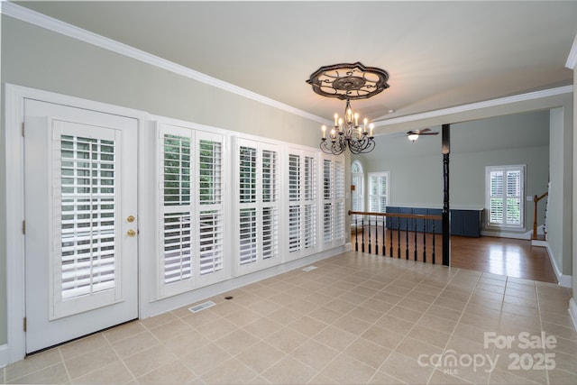 4672 Snow Dr, Harrisburg, NC 28075 - unfurnished dining area featuring crown molding, a chandelier, ceiling fan, and tile patterned flooring