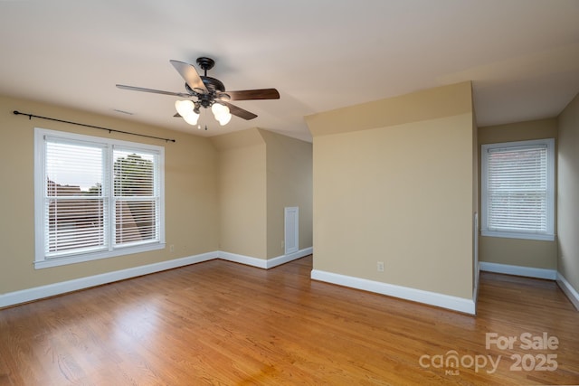 4672 Snow Dr, Harrisburg, NC 28075 - empty room with ceiling fan, baseboards, and light wood-style floors