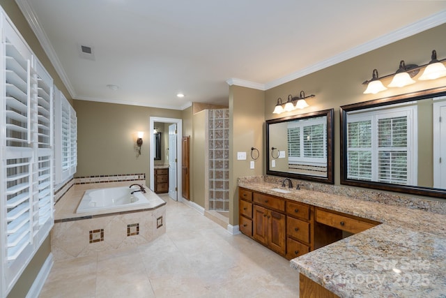 4672 Snow Dr, Harrisburg, NC 28075 - full bath featuring a garden tub, vanity, ornamental molding, baseboards, and tile patterned flooring