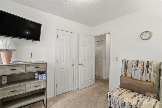 209 Mcfadden St, Rock Hill, SC 29730 - living area featuring light colored carpet and a textured ceiling