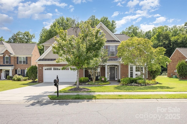 10106 Silverling Dr, Waxhaw, NC 28173 - view of front of house featuring driveway, a front yard, a standing seam roof, and brick siding