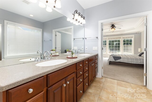 10106 Silverling Dr, Waxhaw, NC 28173 - full bath featuring ensuite bathroom, double vanity, tile patterned flooring, and a ceiling fan