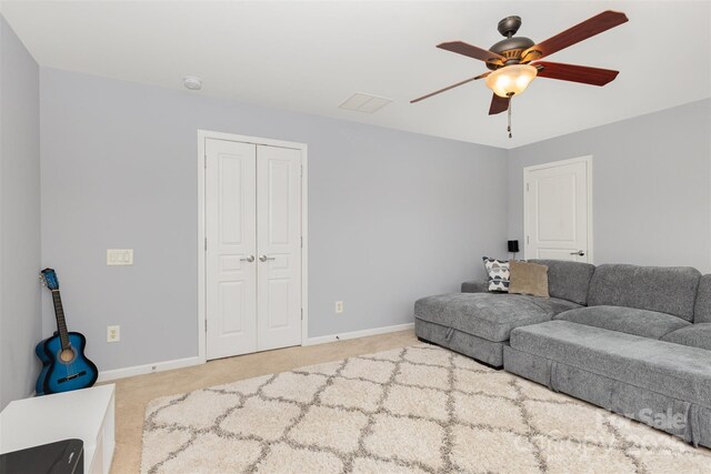 10106 Silverling Dr, Waxhaw, NC 28173 - carpeted living area featuring a ceiling fan and baseboards