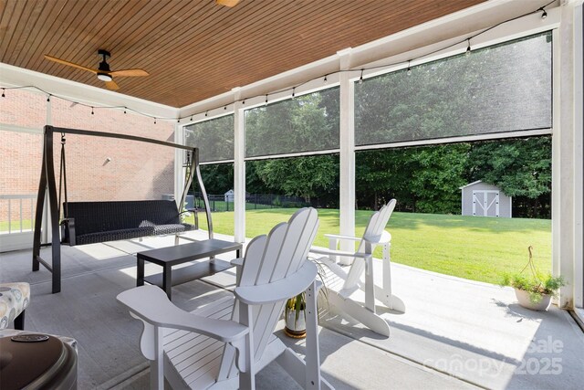 10106 Silverling Dr, Waxhaw, NC 28173 - view of patio featuring a storage unit, ceiling fan, and an outdoor living space