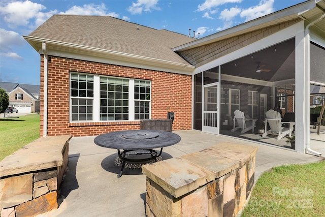 10106 Silverling Dr, Waxhaw, NC 28173 - view of patio / terrace featuring a sunroom and an outdoor fire pit