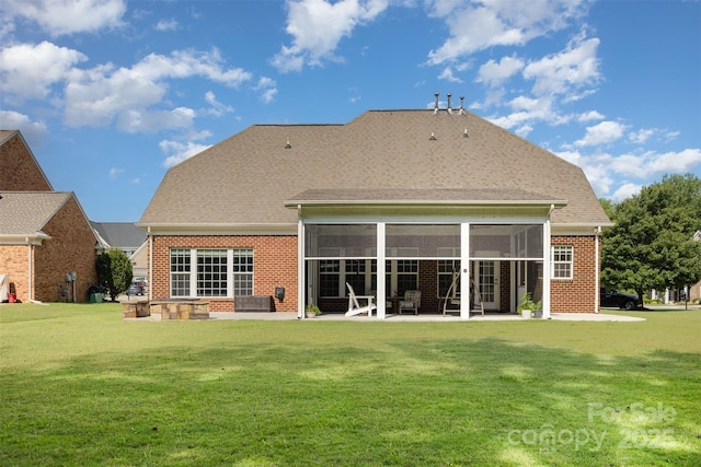 10106 Silverling Dr, Waxhaw, NC 28173 - rear view of property featuring brick siding, a lawn, a sunroom, and a patio