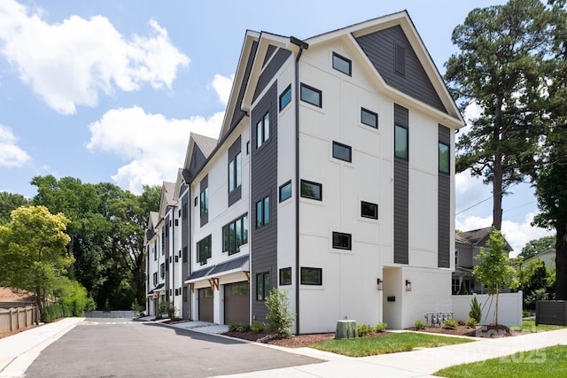 4203 Walker Rd, Charlotte, NC 28211 - view of building exterior featuring an attached garage