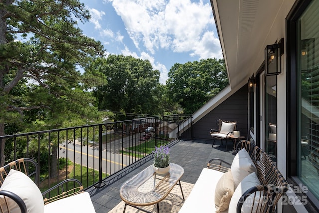 4203 Walker Rd, Charlotte, NC 28211 - patio / terrace with an outdoor hangout area and view of wooded area