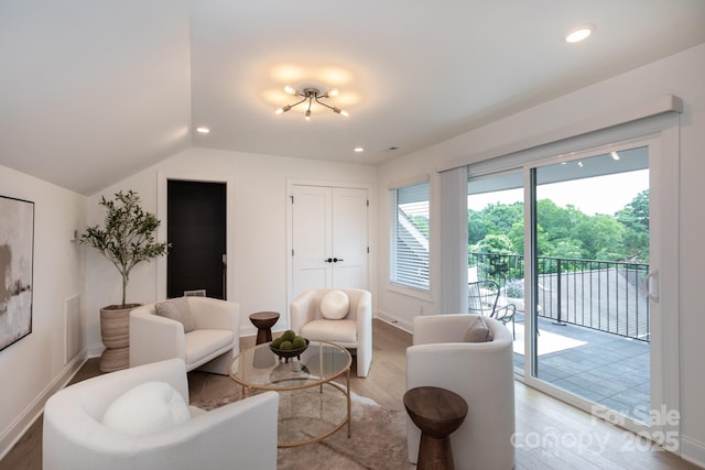4203 Walker Rd, Charlotte, NC 28211 - living area featuring light wood-style floors, lofted ceiling, and recessed lighting