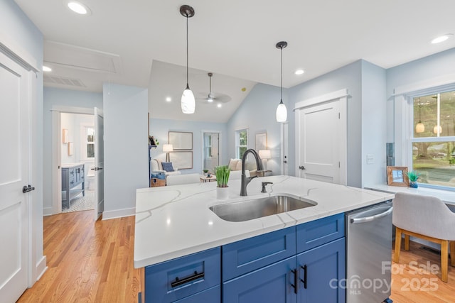 2421 Morton St, Charlotte, NC 28208 - kitchen featuring dishwasher, a sink, blue cabinets, open floor plan, and recessed lighting