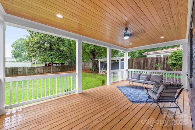 2421 Morton St, Charlotte, NC 28208 - wooden terrace featuring an outdoor living space and a sunroom