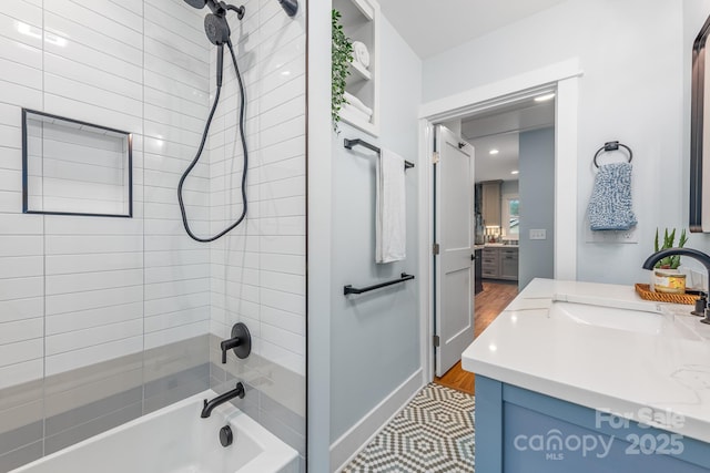 2421 Morton St, Charlotte, NC 28208 - full bathroom with vanity, shower / bathtub combination, and wood finished floors