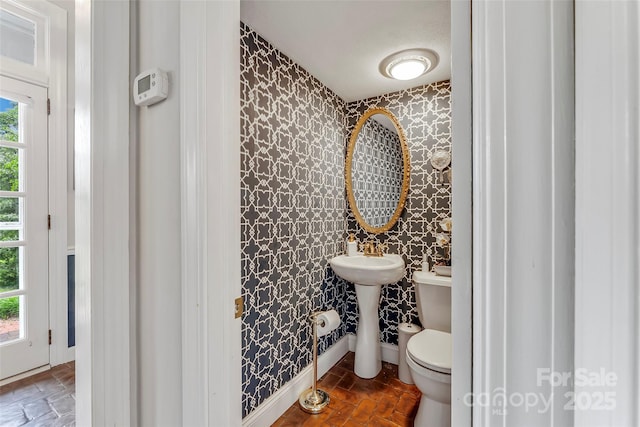 958 US-64, Morganton, NC 28655 - bathroom featuring wallpapered walls and an accent wall