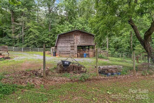 958 US-64, Morganton, NC 28655 - view of outdoor structure featuring a forest view