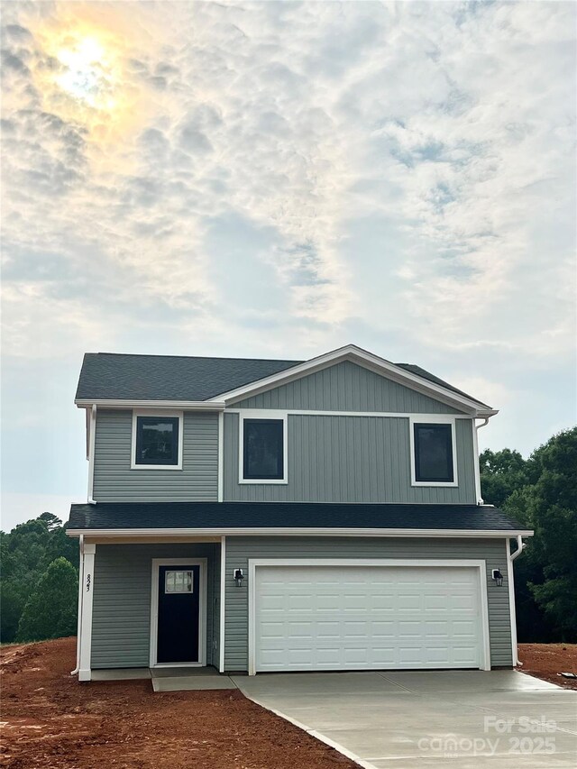 823 32nd St NE, Conover, NC 28613 - view of front of home featuring an attached garage and concrete driveway