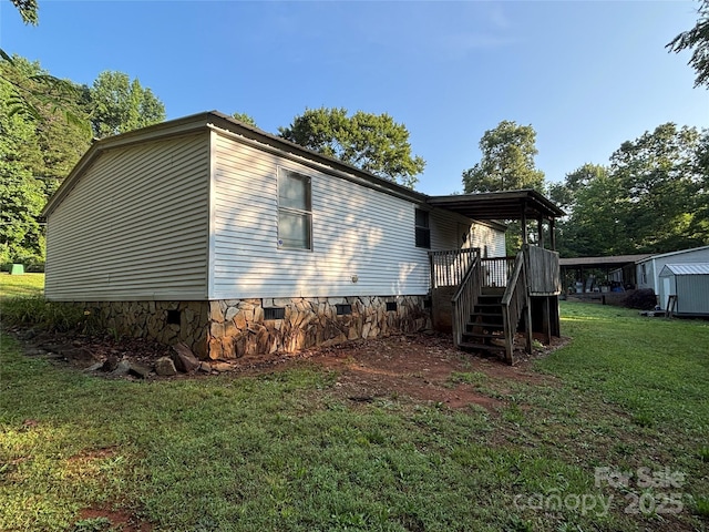 6544 Helens Way, Denver, NC 28037 - view of property exterior featuring a lawn, crawl space, and stairs