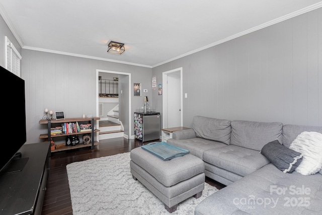 4200 Tyndale Ave, Charlotte, NC 28210 - living room with dark wood finished floors, crown molding, and stairway