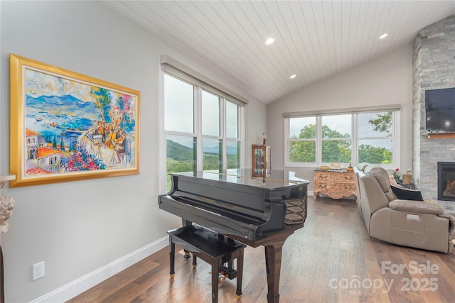 24 Herron View Ln, Weaverville, NC 28787 - sitting room featuring vaulted ceiling, hardwood / wood-style flooring, a stone fireplace, wood ceiling, and recessed lighting