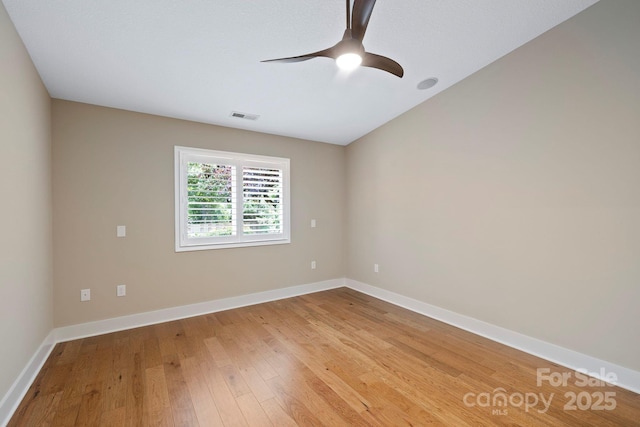 50 Beekeeper Trl, Swannanoa, NC 28778 - empty room with light wood-style floors, a ceiling fan, and baseboards