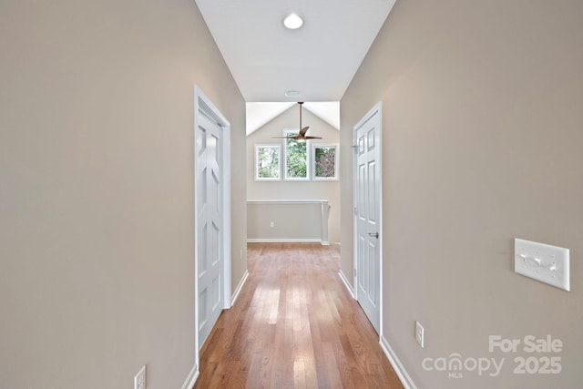 50 Beekeeper Trl, Swannanoa, NC 28778 - corridor featuring vaulted ceiling, light wood-style floors, and baseboards
