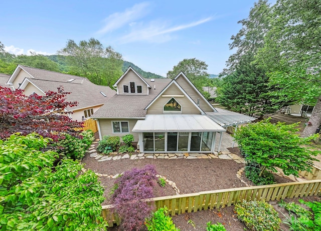 50 Beekeeper Trl, Swannanoa, NC 28778 - rear view of property with a sunroom and roof with shingles