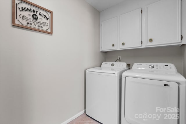 1330 5th St NE Unit 11, Hickory, NC 28601 - laundry room with cabinet space, washer and clothes dryer, and baseboards