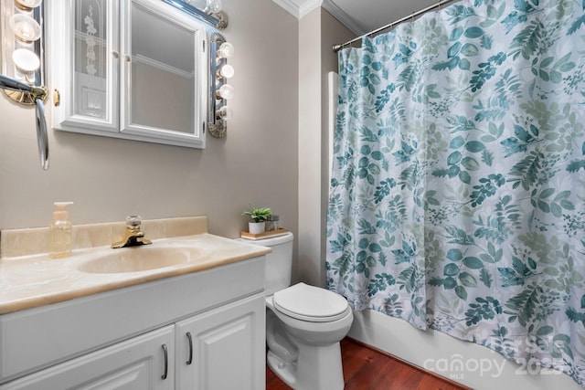 1330 5th St NE Unit 11, Hickory, NC 28601 - bathroom with vanity, crown molding, toilet, wood finished floors, and shower / tub combo with curtain