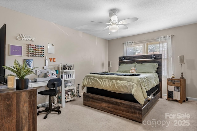 1330 5th St NE Unit 11, Hickory, NC 28601 - carpeted bedroom with an office area, a textured ceiling, baseboards, and a ceiling fan