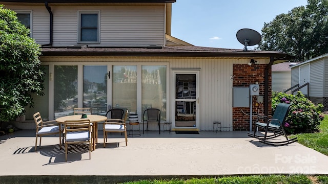 1330 5th St NE Unit 11, Hickory, NC 28601 - back of property with a patio, brick siding, and outdoor dining space