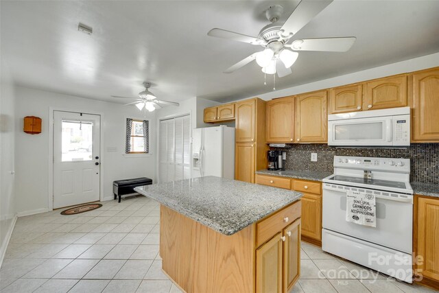 2111 Parkdale Ave, Gastonia, NC 28052 - kitchen with white appliances, ceiling fan, light tile patterned flooring, and tasteful backsplash
