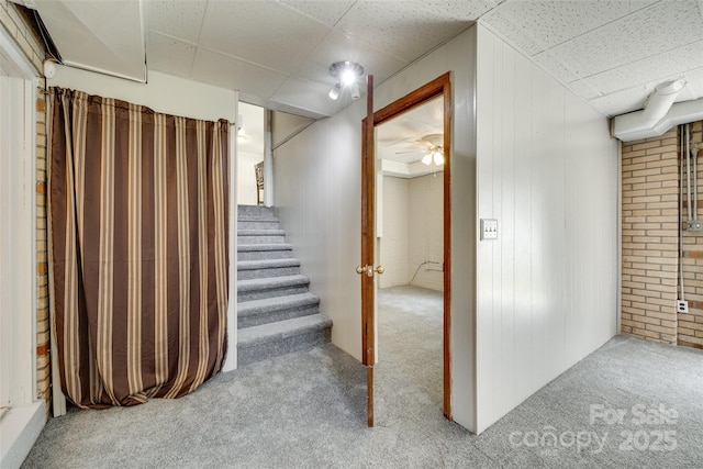 2111 Parkdale Ave, Gastonia, NC 28052 - finished below grade area with carpet flooring, a drop ceiling, and stairs