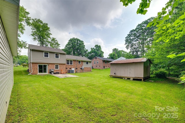 2111 Parkdale Ave, Gastonia, NC 28052 - view of green lawn with a patio and central air condition unit