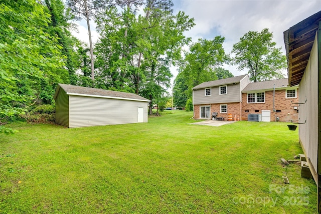 2111 Parkdale Ave, Gastonia, NC 28052 - view of grassy yard with a patio, an outbuilding, and central AC unit