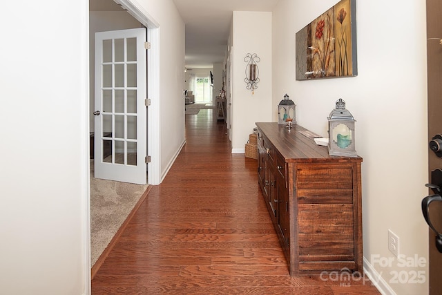 7328 Strawberry Fields Ln, Charlotte, NC 28278 - hall with dark wood-style flooring and baseboards