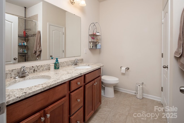 7328 Strawberry Fields Ln, Charlotte, NC 28278 - bathroom with double vanity, toilet, a shower, tile patterned flooring, and baseboards
