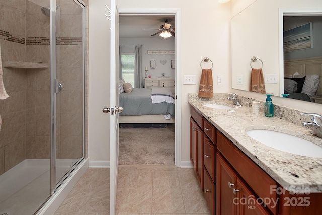 7328 Strawberry Fields Ln, Charlotte, NC 28278 - full bath featuring connected bathroom, double vanity, a ceiling fan, a shower stall, and baseboards