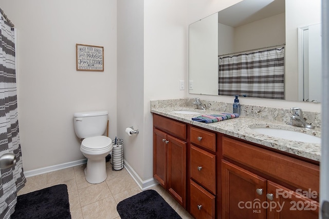 7328 Strawberry Fields Ln, Charlotte, NC 28278 - full bath with double vanity, baseboards, toilet, and tile patterned flooring