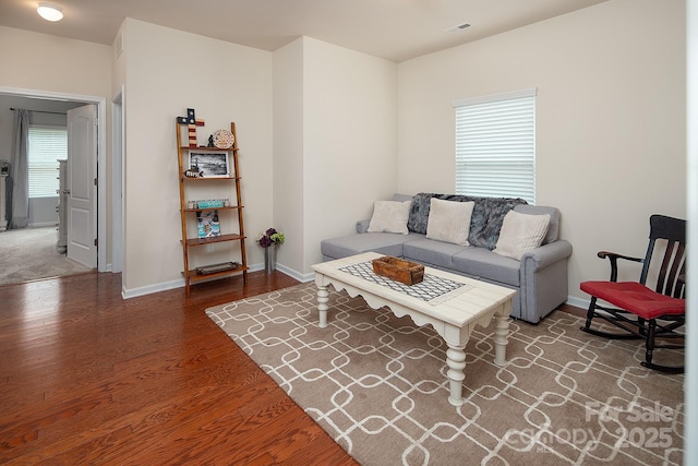 7328 Strawberry Fields Ln, Charlotte, NC 28278 - living room featuring wood finished floors and baseboards
