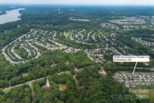 7328 Strawberry Fields Ln, Charlotte, NC 28278 - aerial view of a large body of water and a forest