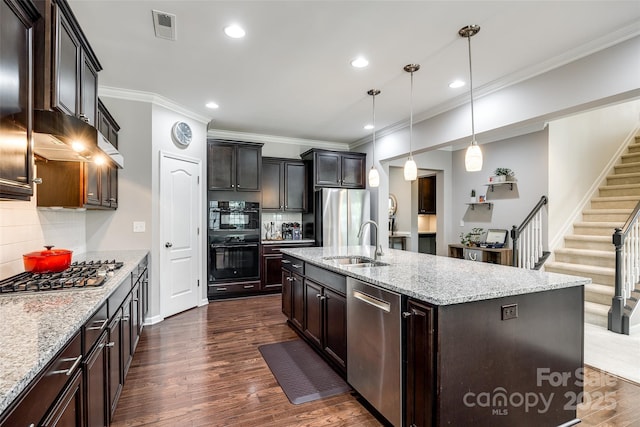 129 Hawks Creek Pkwy, Fort Mill, SC 29708 - kitchen with stainless steel appliances, recessed lighting, ornamental molding, dark wood finished floors, and decorative backsplash