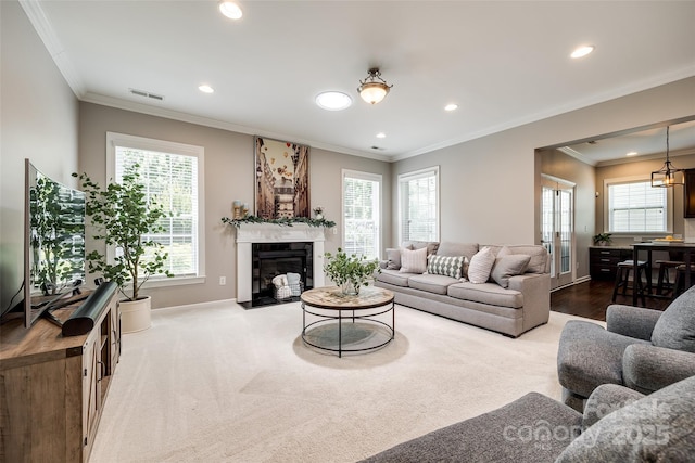 129 Hawks Creek Pkwy, Fort Mill, SC 29708 - living area with recessed lighting, ornamental molding, and a fireplace with flush hearth