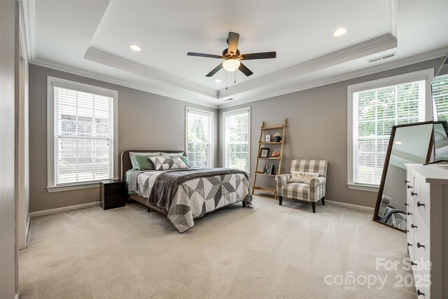 129 Hawks Creek Pkwy, Fort Mill, SC 29708 - bedroom featuring a tray ceiling, light colored carpet, ornamental molding, recessed lighting, and ceiling fan