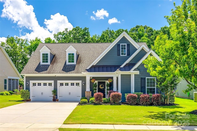 129 Hawks Creek Pkwy, Fort Mill, SC 29708 - view of front of house with a garage, concrete driveway, a shingled roof, and a front yard