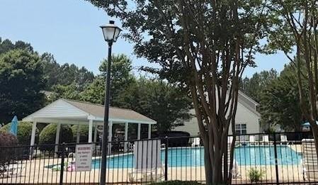 10223 Reindeer Way Ln, Charlotte, NC 28216 - community pool with a patio