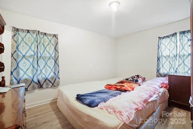 924 Carrington Dr, Charlotte, NC 28214 - bedroom featuring wood finished floors and baseboards